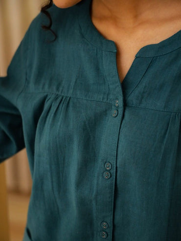 The Set Includes a Breezy Top and Matching Bottoms, Tailored for a Relaxed Fit That Allows You to Mo