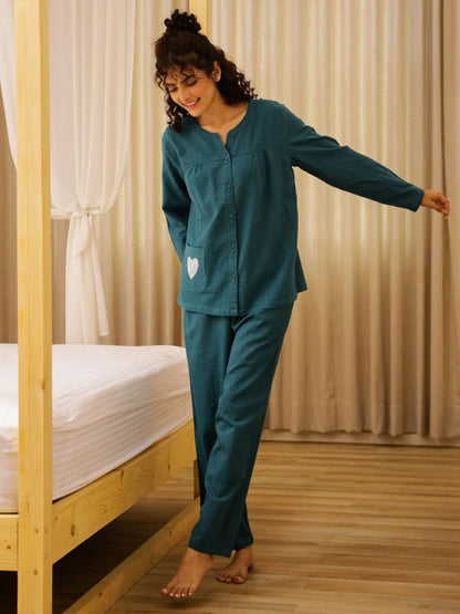 The Set Includes a Breezy Top and Matching Bottoms, Tailored for a Relaxed Fit That Allows You to Mo