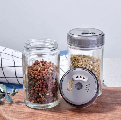Seven Piece Spice Jar Set with Glass Organizer and Rotating Rack Ideal for Seasoning